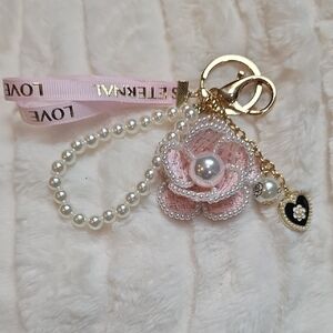Elegant Pink and Gold Keychain with Pearl Accents